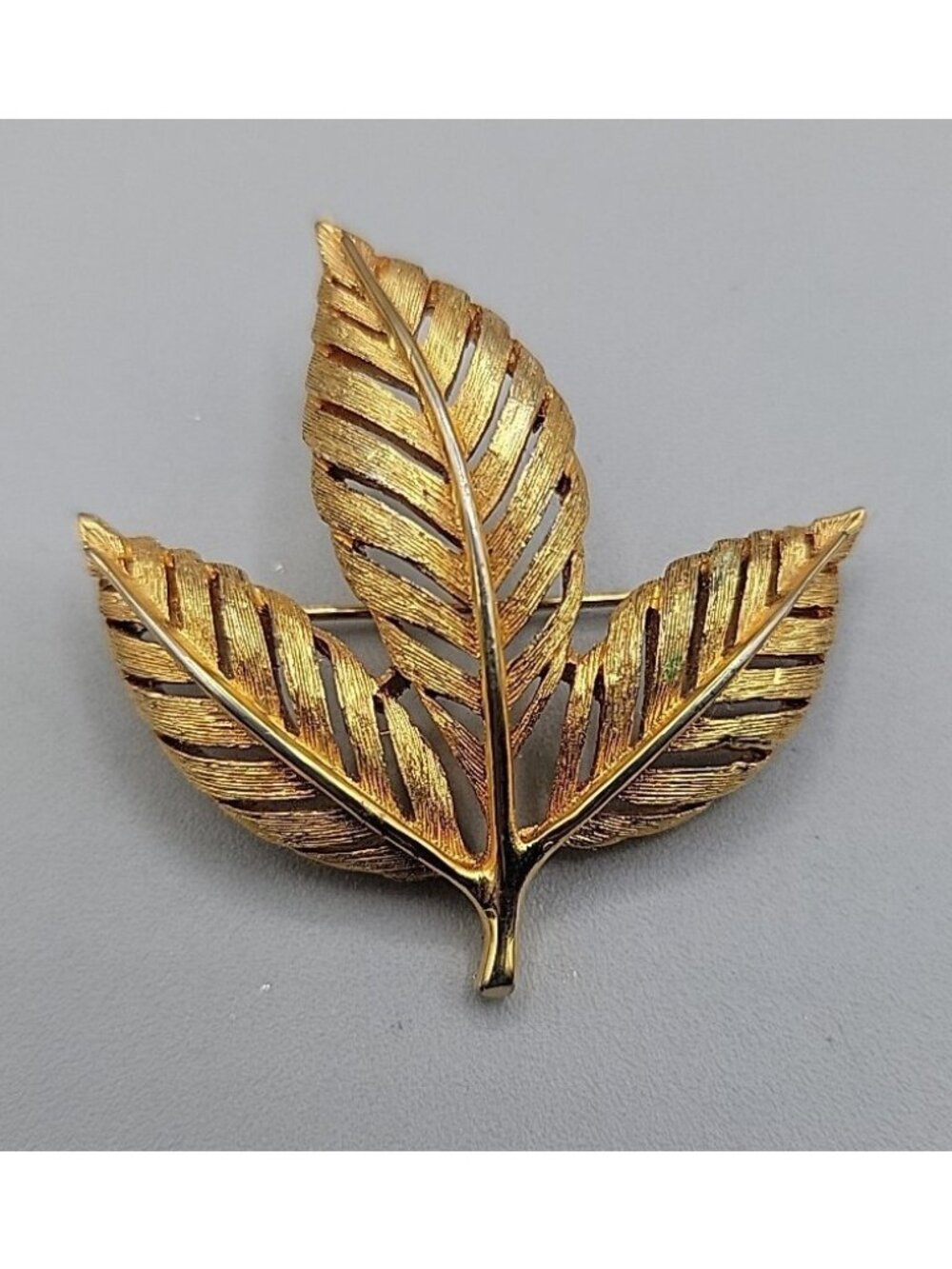 Vintage Alan J Stylized Leaf Brooch Bright Brushed Gold Tone Open Metal Work